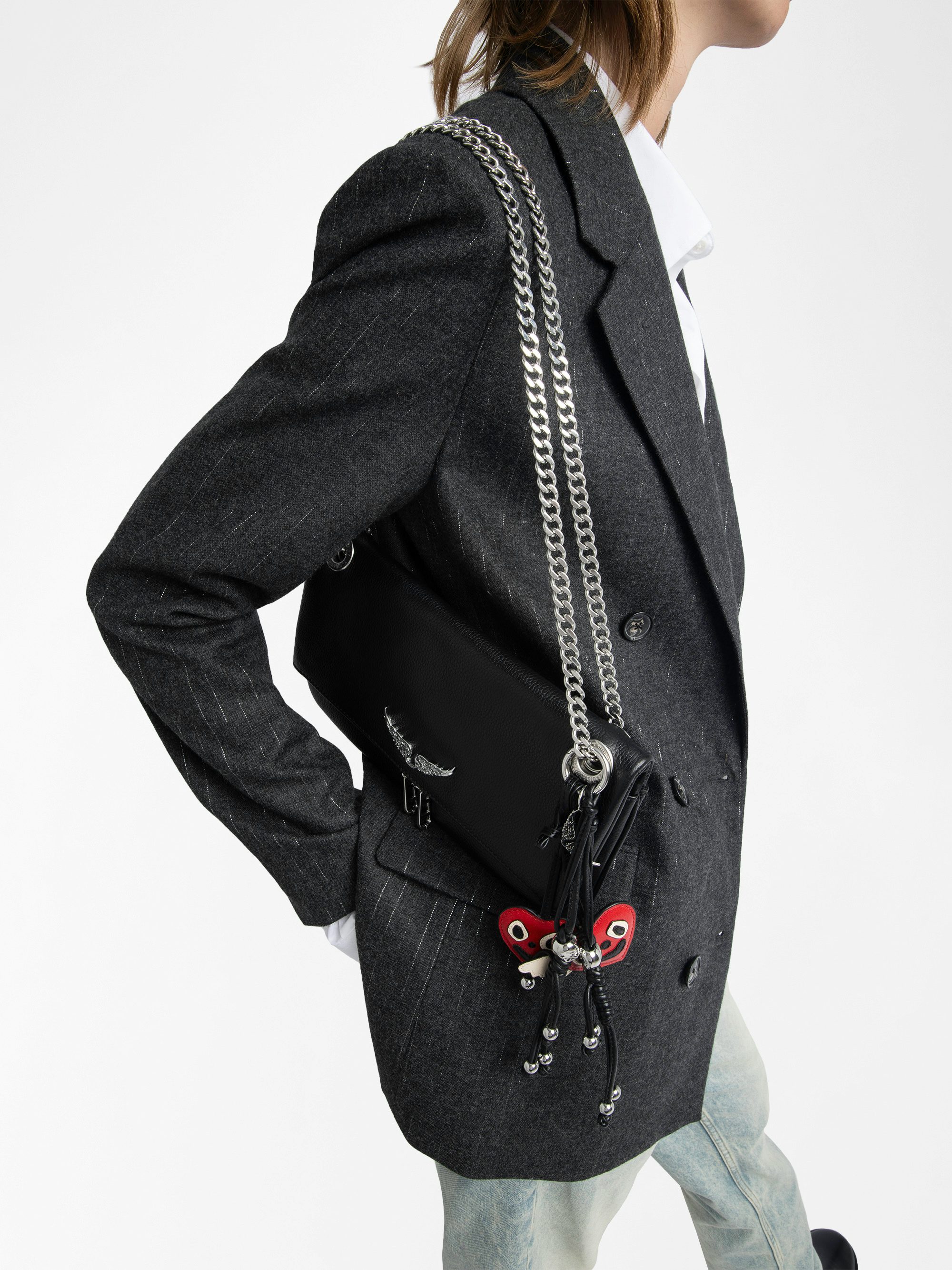 Rock II Clutch - Clutch in grained leather with sliding metal chain and signature wings.